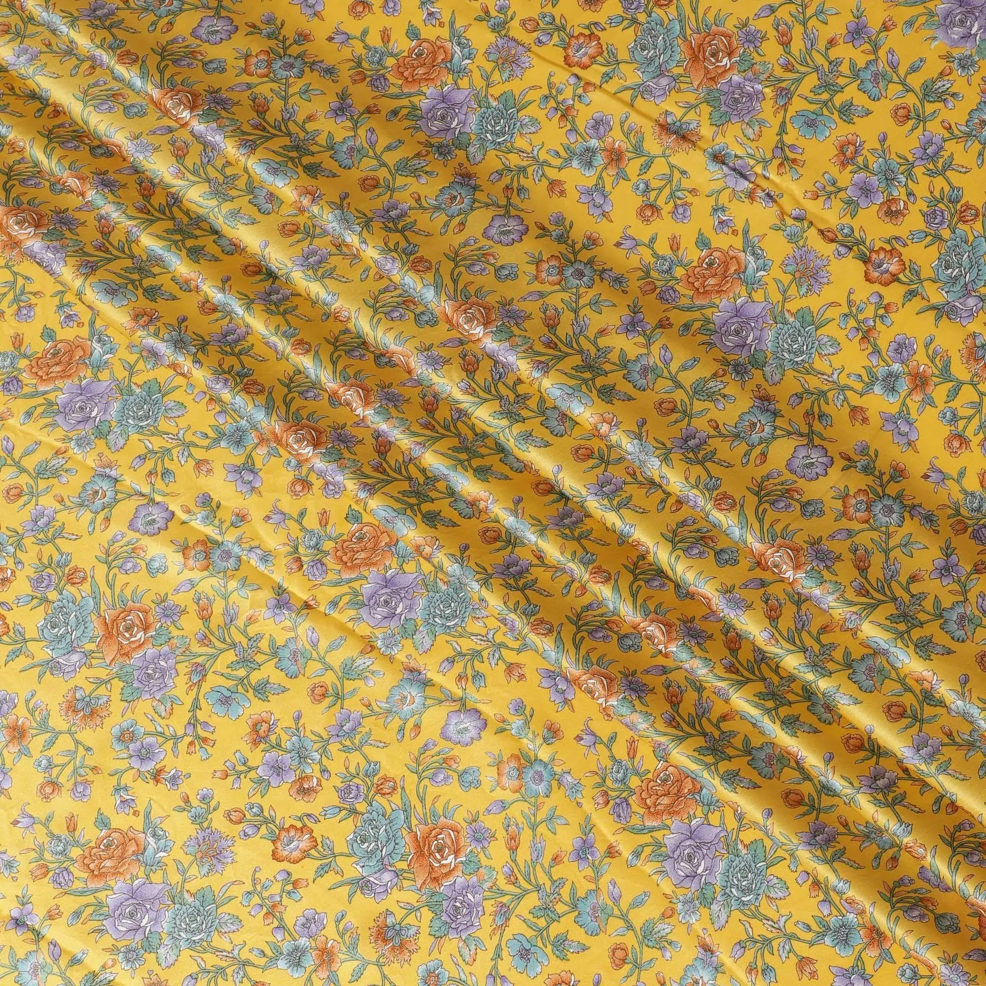 Dandelion yellow silk satin fabric with green, orange & violet prints in floral design-D11141