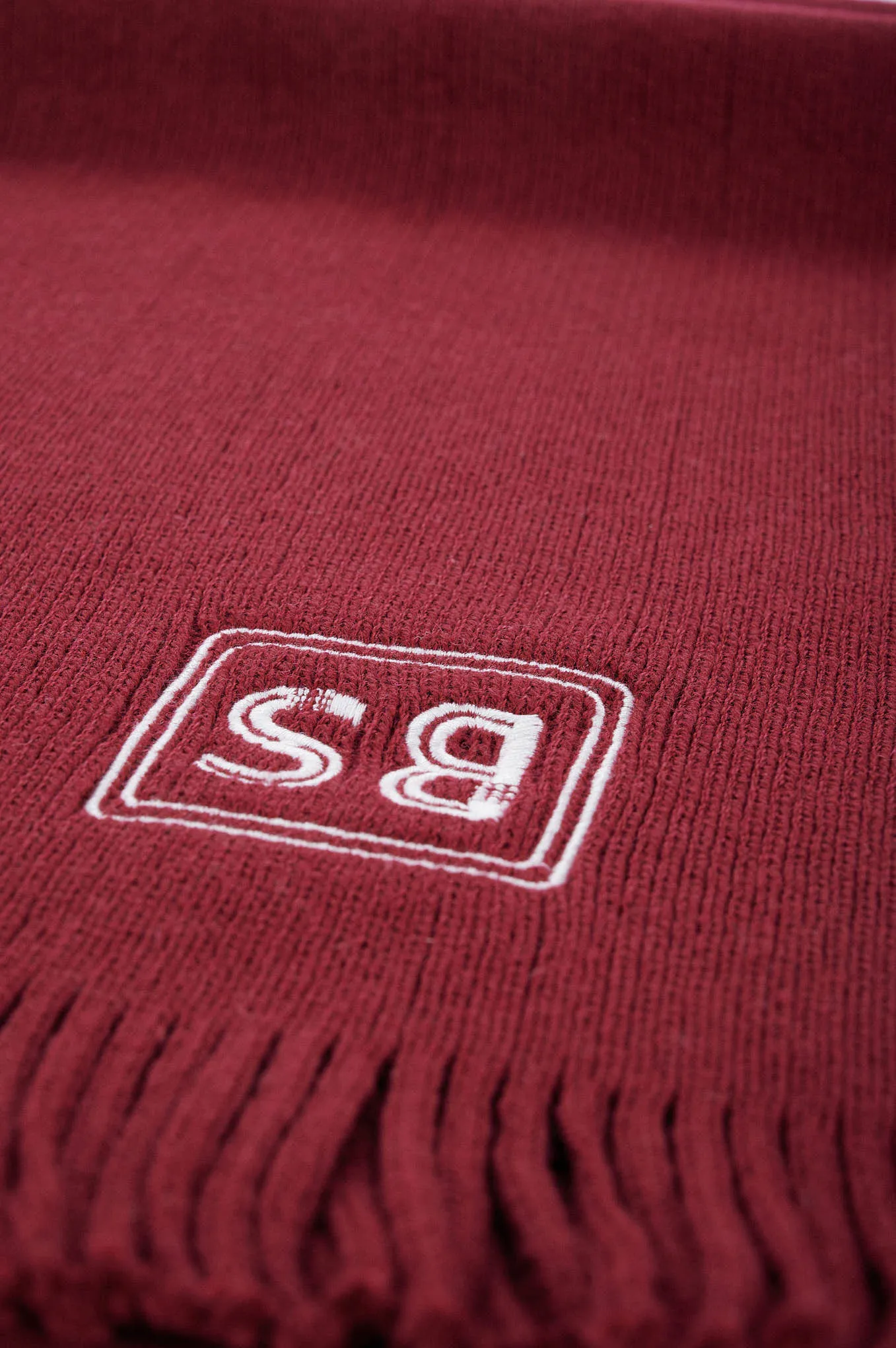 Knitted scarf with logo from GEN Z capsule collection