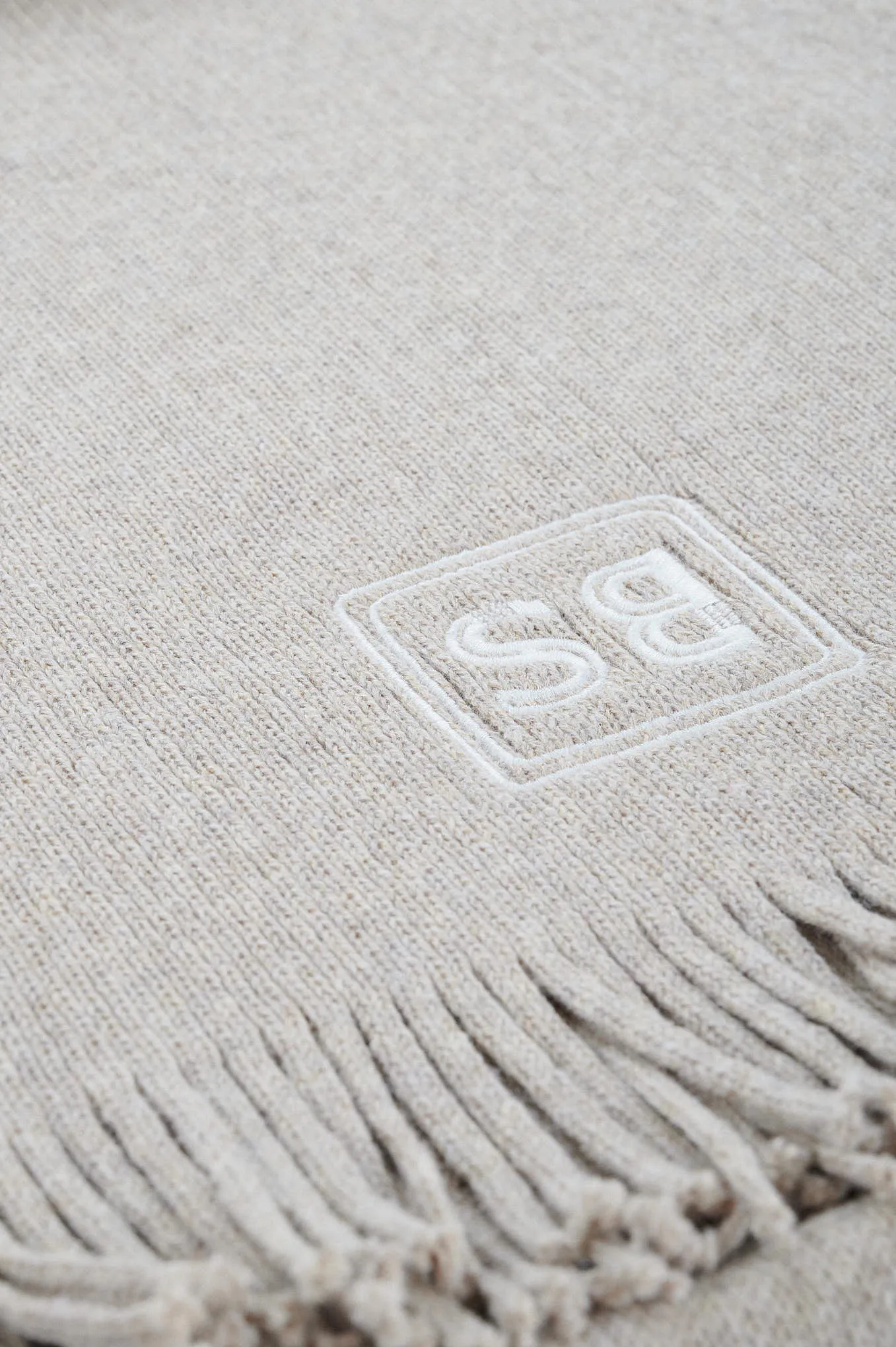 Knitted scarf with logo from GEN Z capsule collection