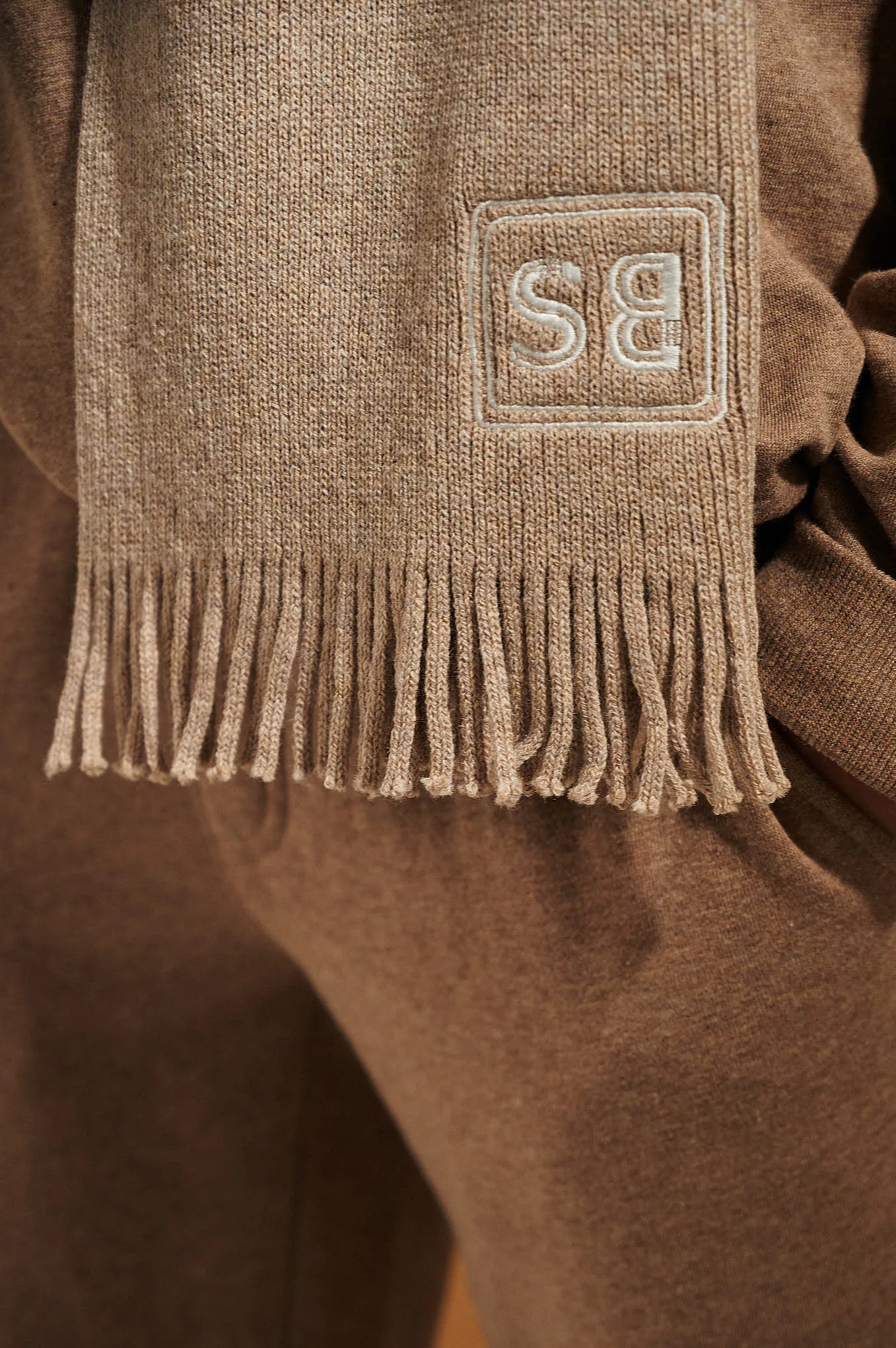 Knitted scarf with logo from GEN Z capsule collection